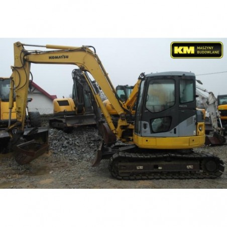 Here is the translation:

**Mini excavadora Komatsu PC78 2006** → **Мини-экскаватор Komatsu PC78 2006 года**