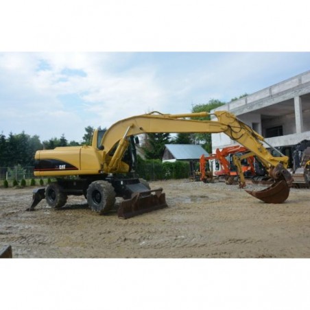 Caterpillar M316 2004 — колесный экскаватор